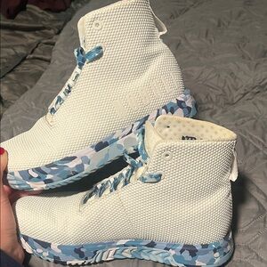 NOBULL White High-Tops with Blue Patterned Sole